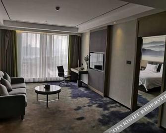 Hanting Premium Hotel Ordos Kangbashi Scenic - Ordos City - Living room