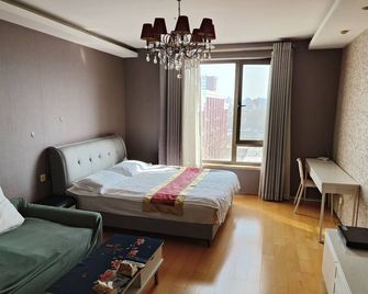 Beijing Yilejia Apartment - Pekín - Habitación