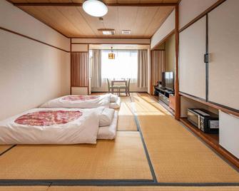Hotel Shin Makomo - Itako - Спальня