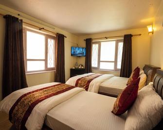 Hotel Harmony & Little Bites Bistro - Lalitpur - Schlafzimmer