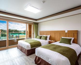 Suandsu Hotel - Чеджу - Спальня