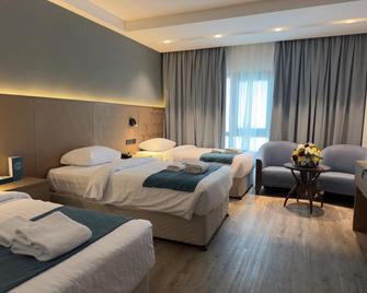 Al Massa Grand Hotel - מכה - חדר שינה