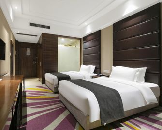 Lavande Hotel Wuhan Yijia Garden Expo Park - Wuhan - Makuuhuone