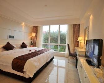 Shanhai Holiday Resort - 海口 - 寝室