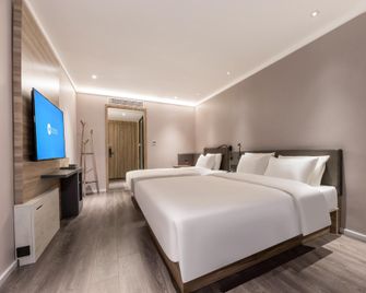 Hanting Hotel Bengbu South Railway Station - Bengbu - Спальня