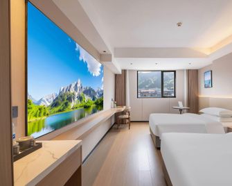 Huayue Shanghao Hotel (Lishui Vocational and Technical College Branch) - Lishui - Slaapkamer