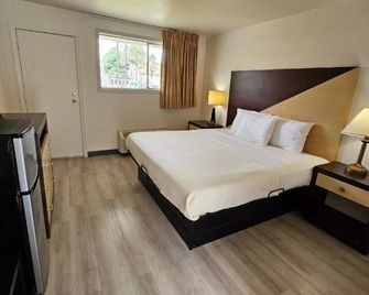 Budget Inn - וויליאמסברג - חדר שינה