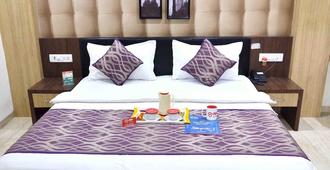 Prashant Hotel Indore - Indore - Schlafzimmer