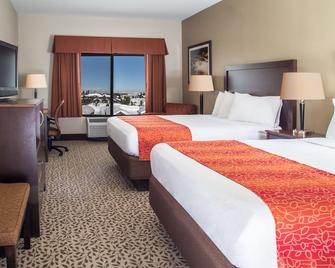 Gray Wolf Inn & Suites - ווסט ילוסטון - חדר שינה