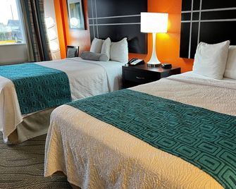 Howard Johnson by Wyndham Houston Heights/Downtown - Houston - Phòng ngủ