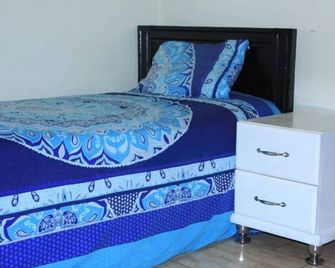 Dream Apartments Uganda - Kampala - Bedroom