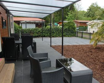 Palmoco Lodge - Lanaken - Patio