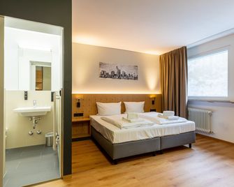 mk hotel frankfurt - Frankfurt am Main - Bedroom
