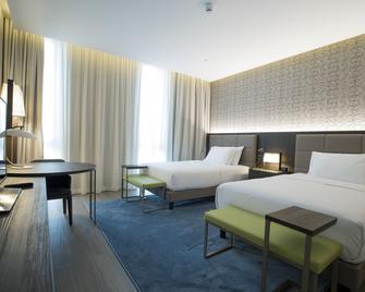 دبل تري باي هيلتون بوينت نوار - بوانت نوار - غرفة نوم