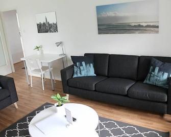 Kotimaailma Apartments Joensuu - Joensuu - Wohnzimmer