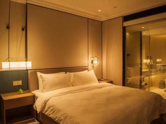 Nantong Youfei Hotel - נאנטונג - חדר שינה