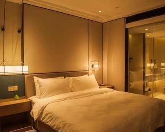 Nantong Youfei Hotel - Nan-tchung - Ložnice
