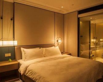 Nantong Youfei Hotel - נאנטונג - חדר שינה