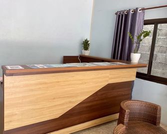 Smile Guesthouse - Vang Vieng - Рецепція