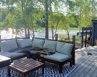 The lake house - boats, beach, sauna, dock and barbecue! - Sandviken - Patio
