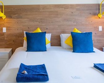 Plett Beachfront Accommodation - פלטנברג ביי - חדר שינה