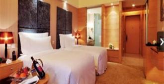 Wudang Argyle Grand International Hotel - Shiyan - Bedroom