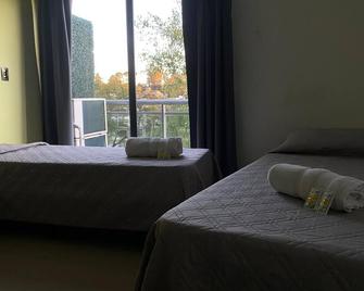 Hotel Golden Ross - Villa Carlos Paz - Makuuhuone