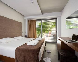 Oktober Downtown Boutique Hotel - Rhodes - Bedroom