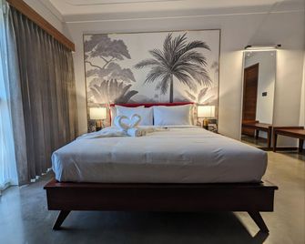 Prasanthi Hotel - Kollam - Camera da letto