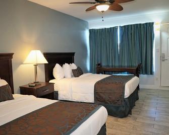 Sunset Beach Hotel - ווילדווד - חדר שינה