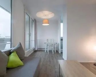 Le Métropolitain - Travel Lyon - Villeurbanne - Wohnzimmer