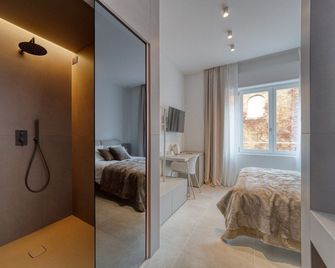 Santa Lucia Suites - Padua - Schlafzimmer