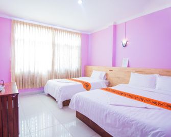 Kim Guesthouse - Phnom Penh - Schlafzimmer