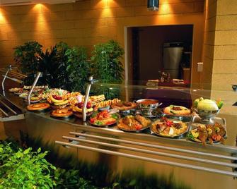 Al Asemah Hotel - Riad - Restaurante