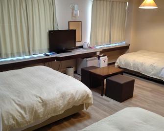 Tsuyama Central Hotel Townhouse - Tsuyama - Habitación
