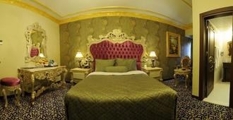 Kaya Premium Hotel - אדנה - חדר שינה
