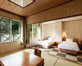 Kamenoi Hotel Arima - קובה - חדר שינה