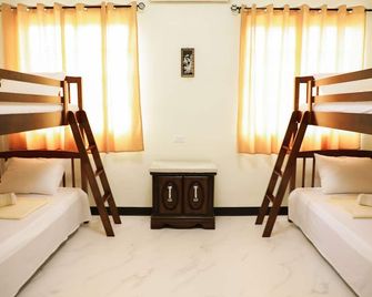 Yogi-Homestay - Koror - Schlafzimmer
