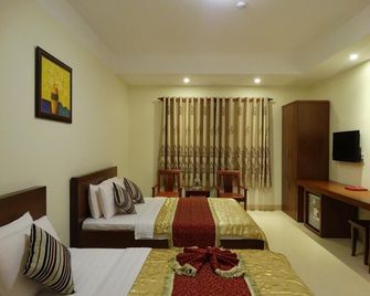 Hoa Vinh Hotel - Ciudad Ho Chi Minh - Habitación