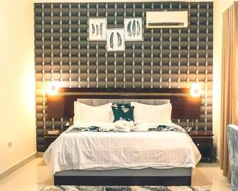 Golden Royale Hotel - Enugu - Camera da letto