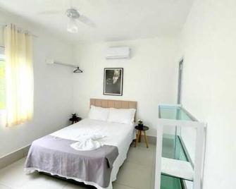 Pousada Village Cozumel - Guarujá - Bedroom