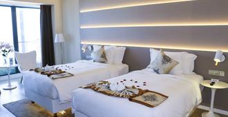 Sanya Phoenix Airport Hotel - Sanya - Bedroom