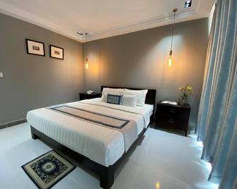 Reasmey Cheanich Hotel - Kampong Cham - Camera da letto