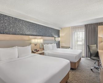 Comfort Inn Aeroport Dorval - Dorval - Ložnice