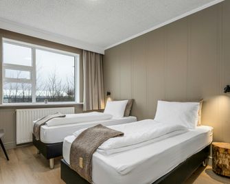 Stracta Hotel Mosfell - Hella - Schlafzimmer