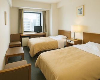 Kariya Plaza Hotel - Kariya - Schlafzimmer