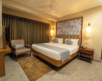 Titanic Boutique Hotel - Baga - Schlafzimmer