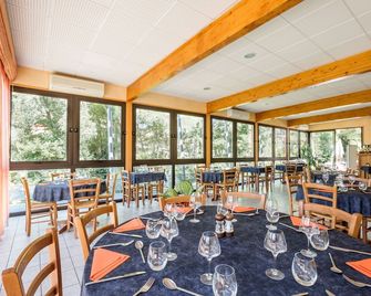 Logis Hotel Restaurant Auberge Les Rives de l'Arzon - Vorey - Restaurante