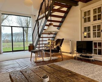 Hus Heverkoog: Vacation under thatch near St. Peter-Ording - Garding - Huiskamer