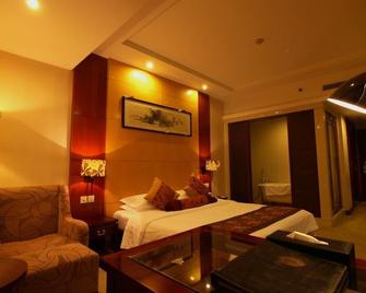 Woge Sizhou Hotel - Chuzhou - Habitación